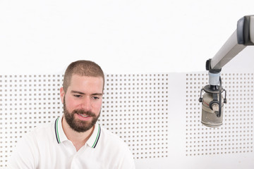 Radio host in his music studio.