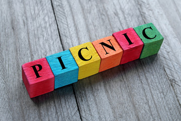 word picnic on colorful wooden cubes