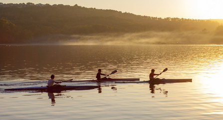 Canoeing in sunset frog