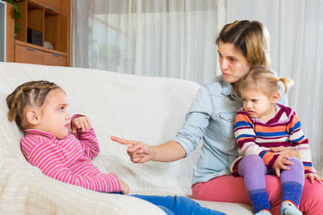 Angry woman shaming child