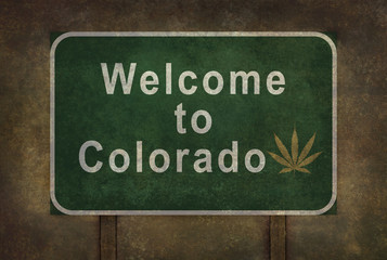 Welcome to Colorado (with marijuana leaf symbol) roadside sign w