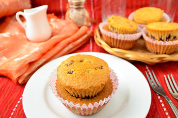 Homemade blackcurrent muffins in paper cupcake holder