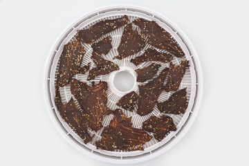 dried beef slices in spices with sesame seeds