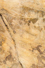 Detailed textured background of sandstone.