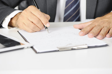 Businessman  writing a document