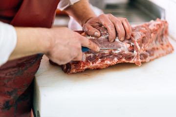 Meet in the butcher shop.