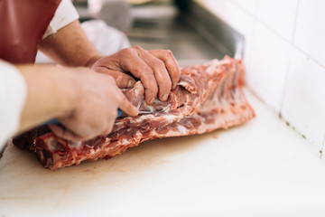 Meet in the butcher shop.