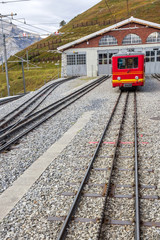 Obraz premium The Jungfrau railway is a metre gauge rack railway which runs 9 km from Kleine Scheidegg to the highest railway station in Europe at Jungfraujoch.