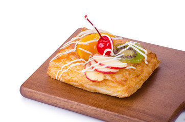 danish pastry with fruits on white background