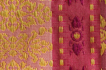 A beautiful piece of very fine Thai silk of the red and pink background design. The red is enriched...