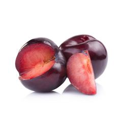 plums isolated on white