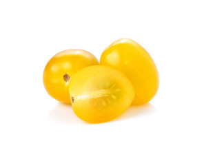 Yellow tomatoes on white background