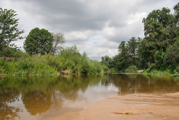 Obraz na płótnie Canvas River on a summer day 