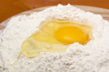 Chicken egg in the flour
