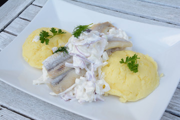 Herring with cream and mashed potatoes