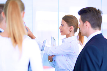 Group of  business people doing presentation with laptop during