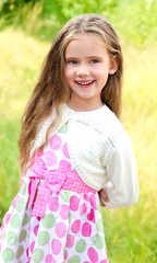 Fototapeta premium Portrait of smiling cute little girl