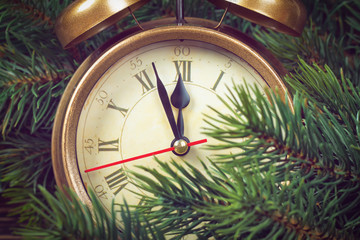 Christmas clock and fir branches