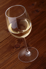 One glass with white wine