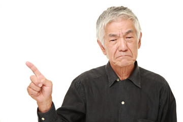 senior Japanese man doubting