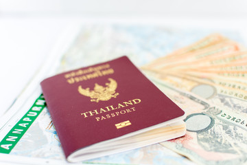Thailand passport for tourism with Annapurna Region Nepal map and Nepali notes.