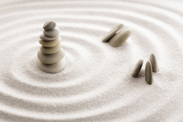 Fototapeta na wymiar Japanese zen garden meditation for concentration and relaxation sand for harmony and balance in pure simplicity - macro lens shot