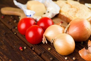 Vegetable in front of bread with Romadur cheese