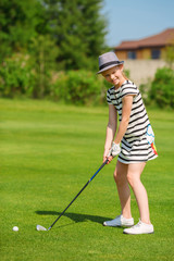 Fototapeta premium Girl playing golf