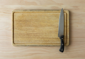 kitchen knife on cutting board