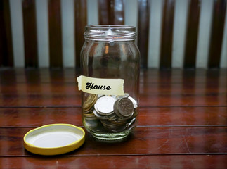 Saving Money Concept With House Text Written Label.Shallow DOF.