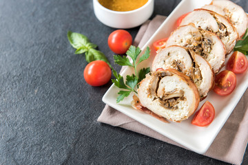 Rolled meat with champignons