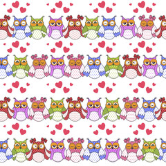 Seamless pattern of colorful owls on a white background