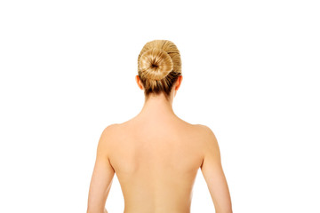 Back of young woman after bath or spa.