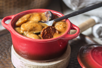 Plate with fabada asturiana, a typical spanish bean stew