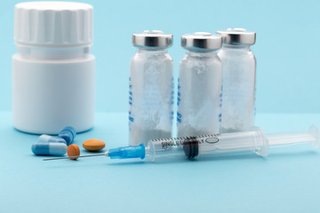 Healthcare and medicine concept.Syringe, pills ,medicine bottle