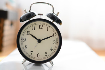Old alarm clock suggesting deadline concept