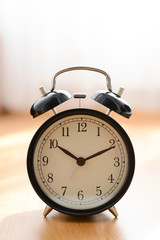 Old alarm clock suggesting deadline concept