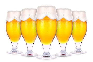 Frosty glasses of light beer isolated 