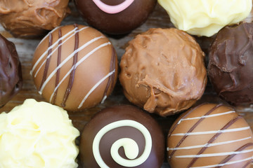 Assorted chocolates and pralines, close up
