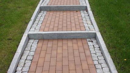 Stairs with red gray cobblestones