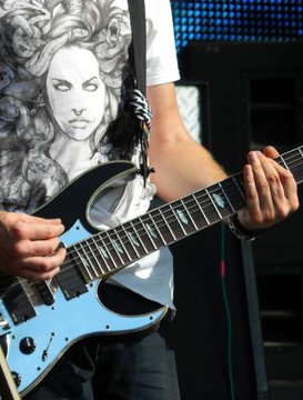 Rock musician playing electric guitar