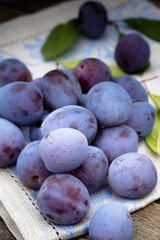 Plums on napkin