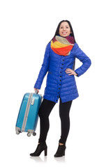 Pretty girl in blue winter jacket with suitcase isolated on