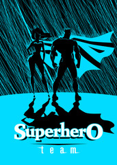 Superhero Couple: Male and female superheroes, posing in front o