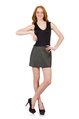Fototapeta premium Red hair girl in gray dress isolated on white