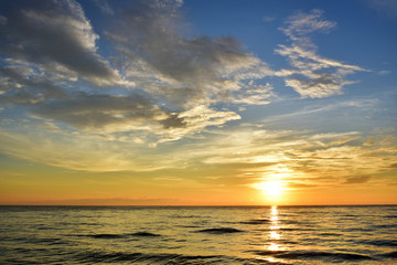 Fototapeta na wymiar The sun rise in the morning seaside beautiful 