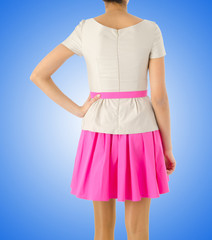 Woman in fashion dress concept on white