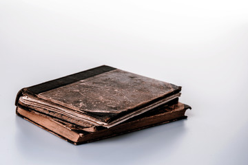 Beautiful old two books closeup on white background