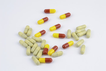 Yellow and red capsules isolated