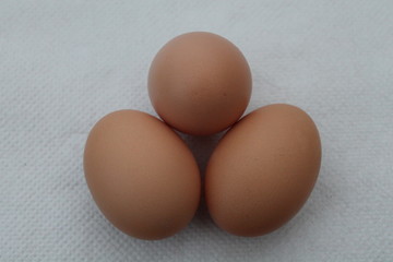 3 eggs isolated on white background.